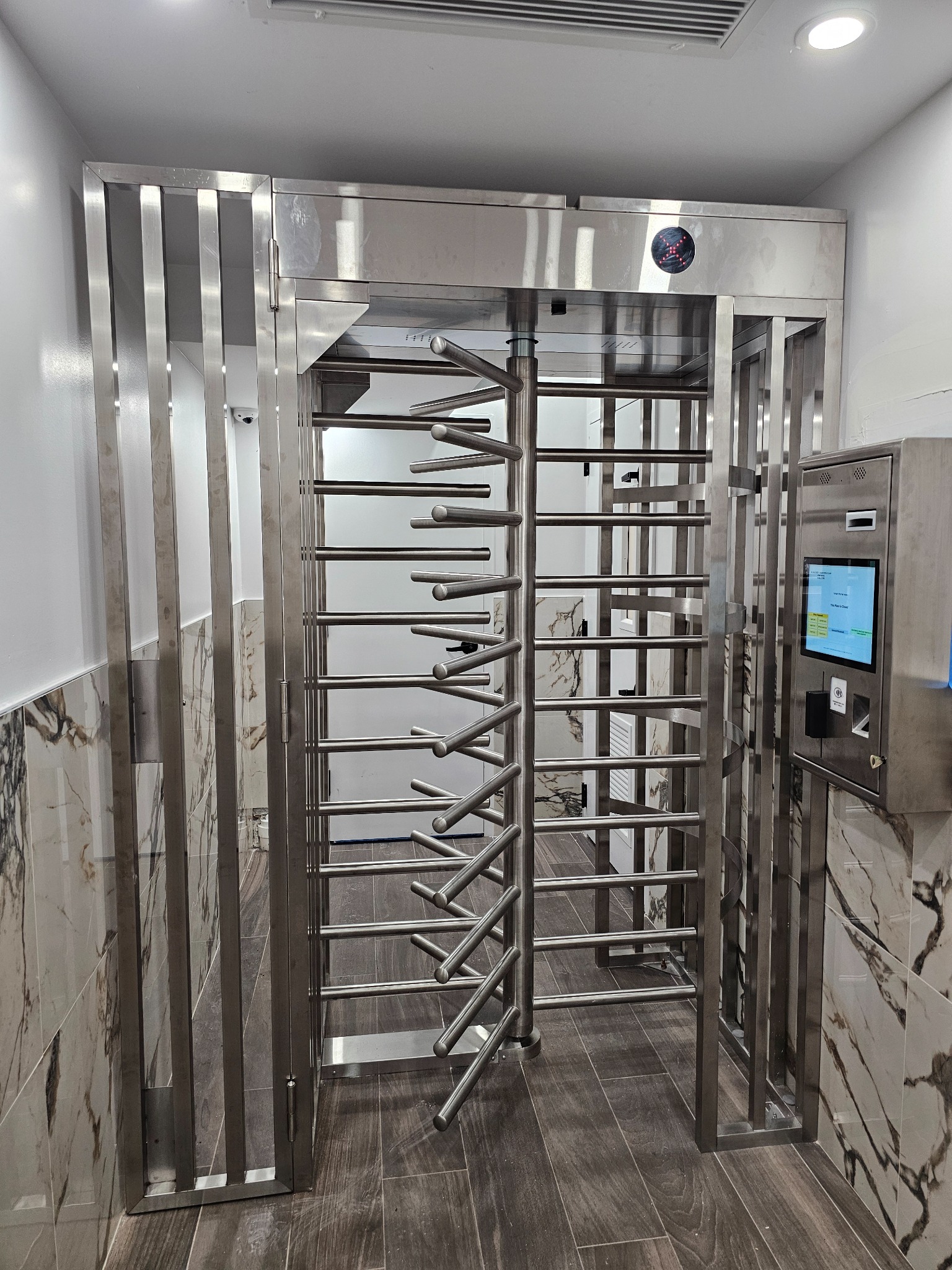 Turnstile with kiosk installation
